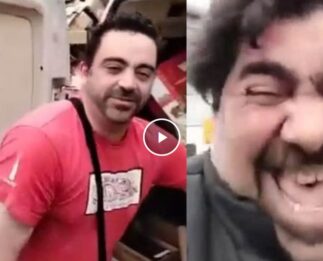 Xavi Hernández recogiendo cartones